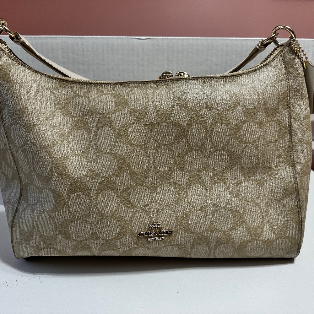 Cream and tan Coach shoulder bag
